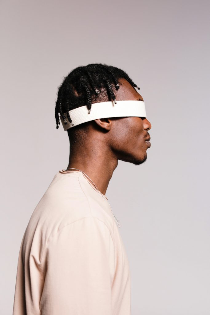 Blindfolded man representing visual impairment 